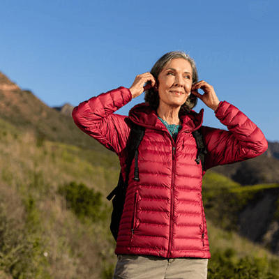 Hiker wearing headphones